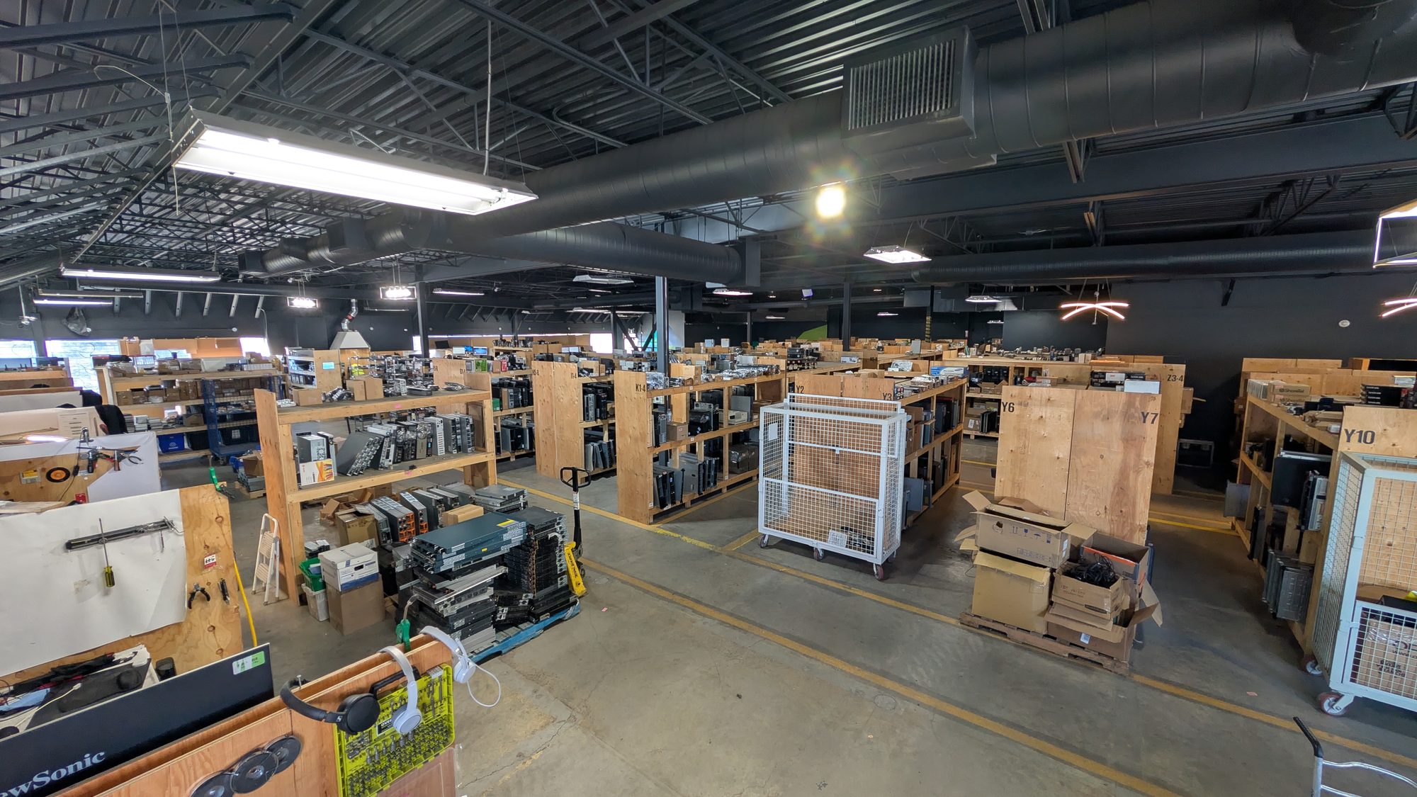 Aisles of inventoried equipment inside an ERA warehouse