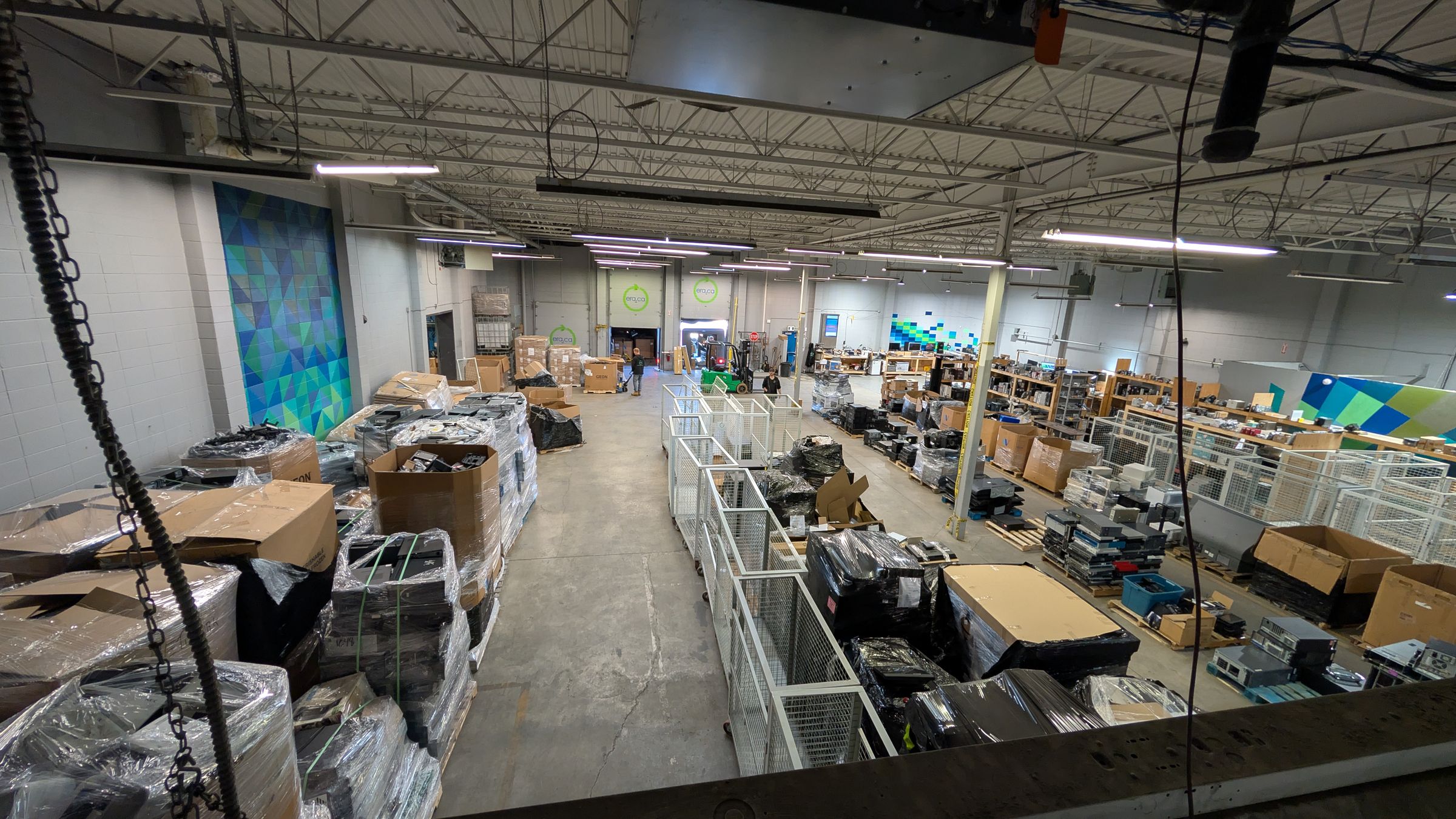 Pallets of packed refurbished devices ready to ship from the warehouse